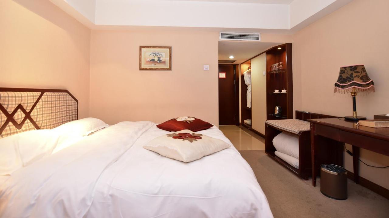 Bremen Holiday Hotel Harbin Bagian luar foto