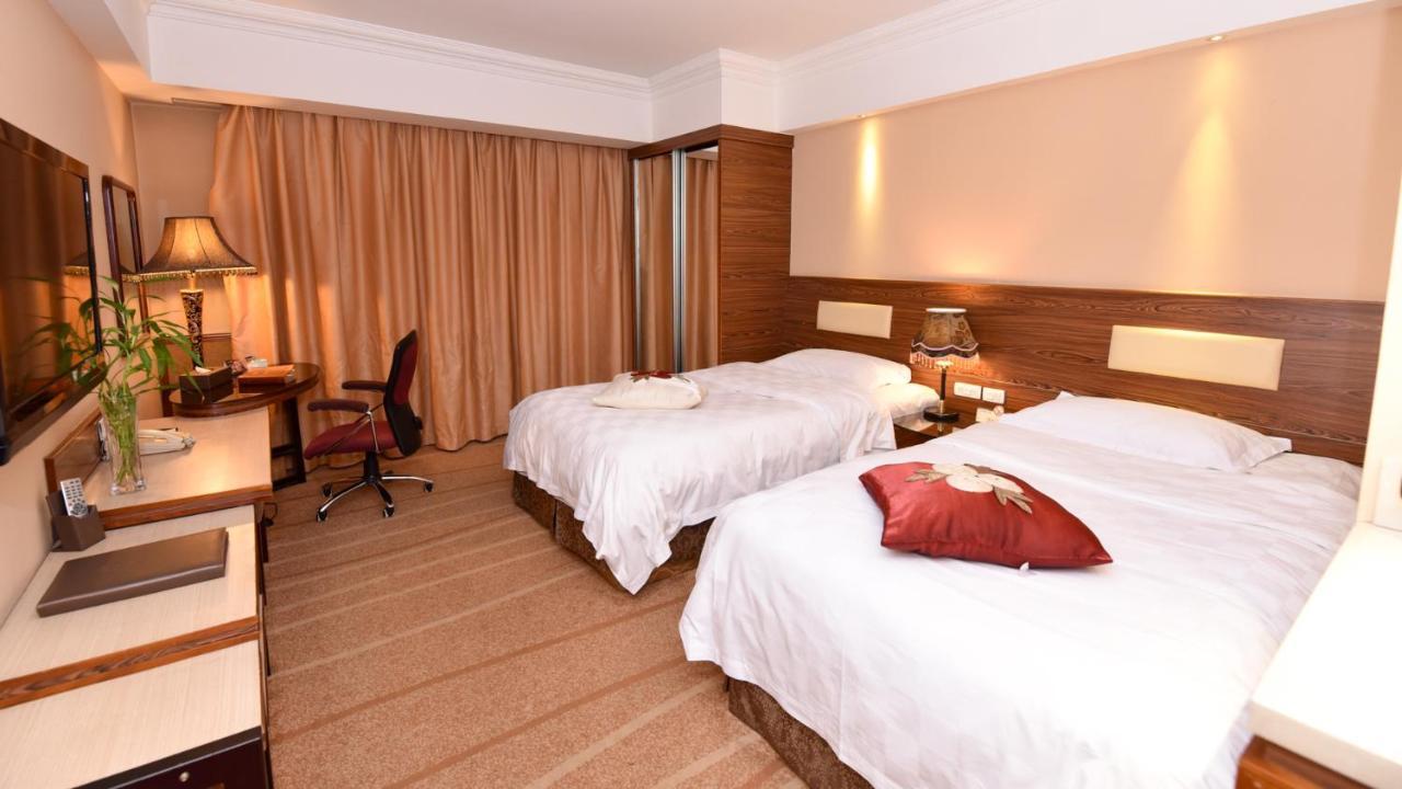 Bremen Holiday Hotel Harbin Bagian luar foto