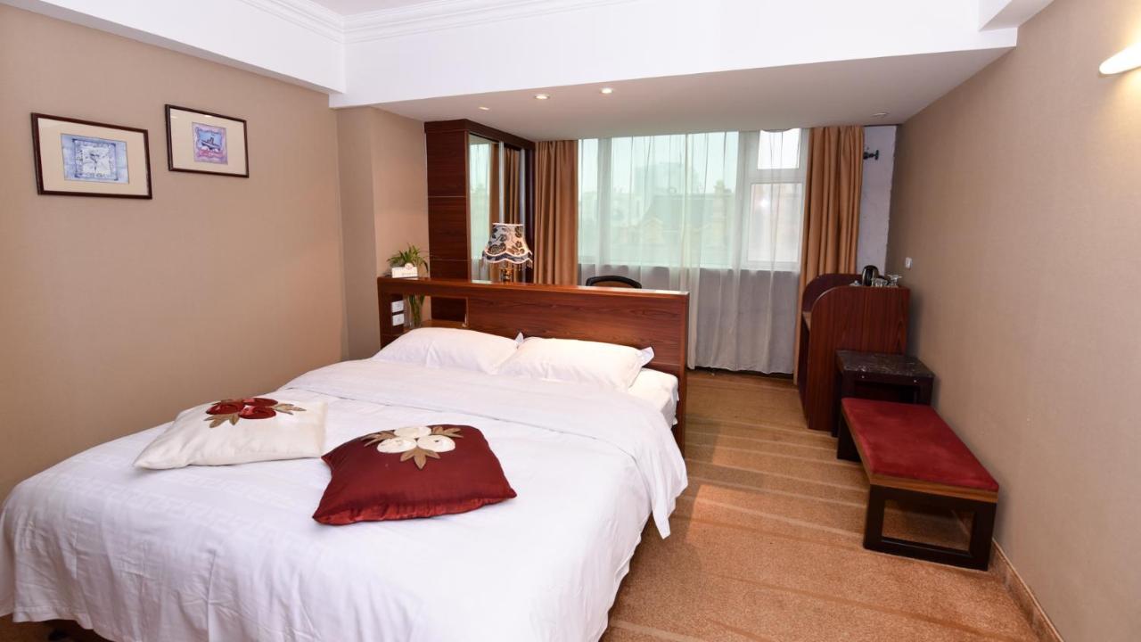 Bremen Holiday Hotel Harbin Bagian luar foto