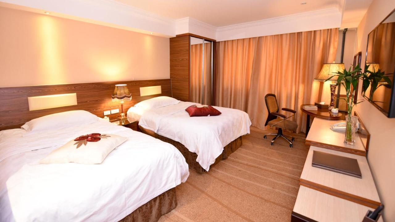 Bremen Holiday Hotel Harbin Bagian luar foto