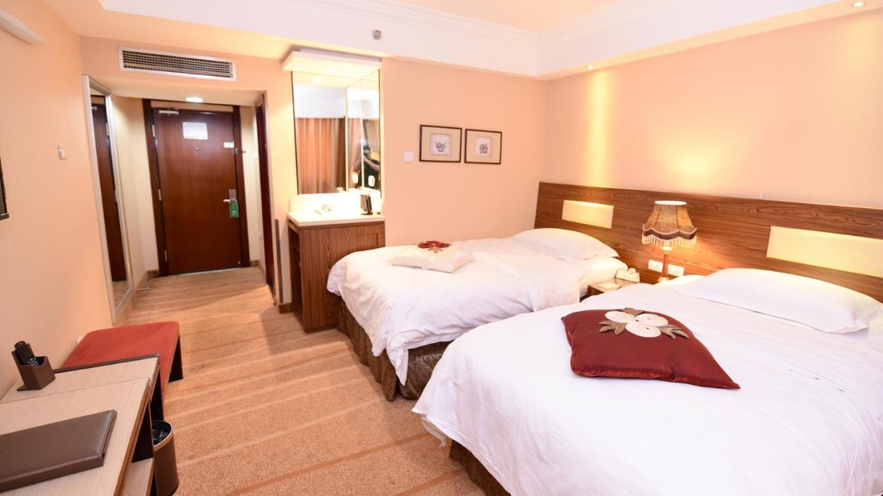 Bremen Holiday Hotel Harbin Bagian luar foto